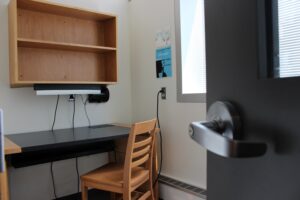 Individual study room with desk and chair