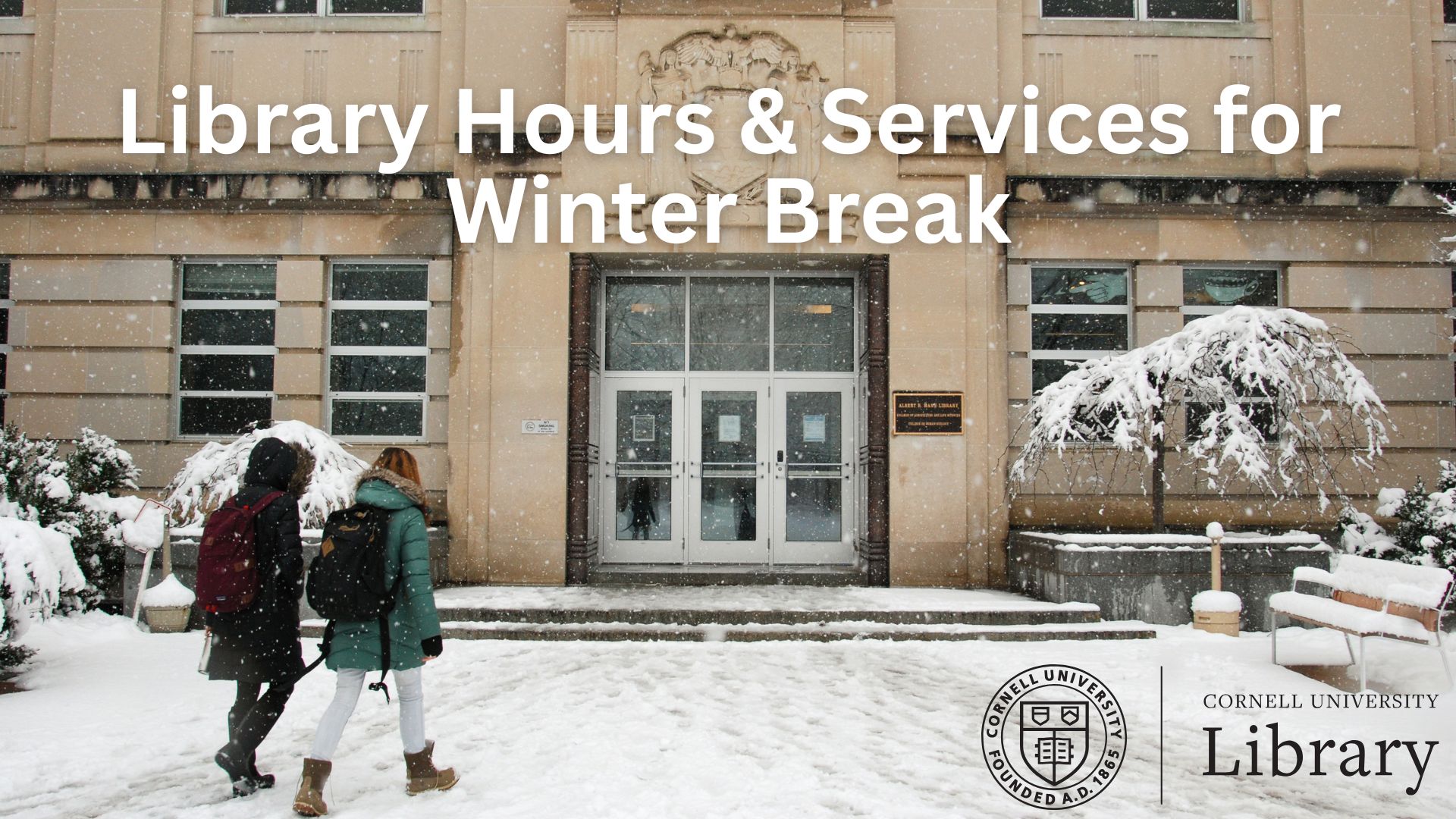 Snow falls outside a campus library as two people walk toward the entrance; overlaid text reads “Library Hours & Services for Winter Break.”