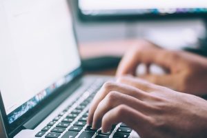 typing on a laptop